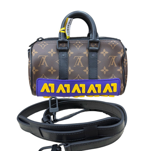 Louis Vuitton Lv Rubber Keepall Bandouliere 25 Monogram Brown
