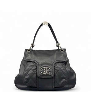 Chanel Quilted Studded Coco Rider Flap Bag Calfskin Black