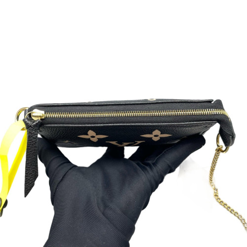 Louis Vuitton Mini Pochette Accessories Empreinte Monogram Giant Black White