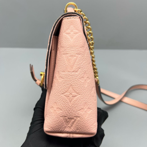 Louis Vuitton Messenger Empreinte Monogram Pink