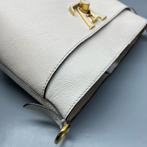 Louis Vuitton Lock And Walk Bucket Calfskin White
