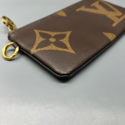 Louis Vuitton Trio Puch Reverse Monogram Brown