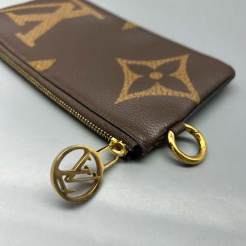 Louis Vuitton Trio Puch Reverse Monogram Brown