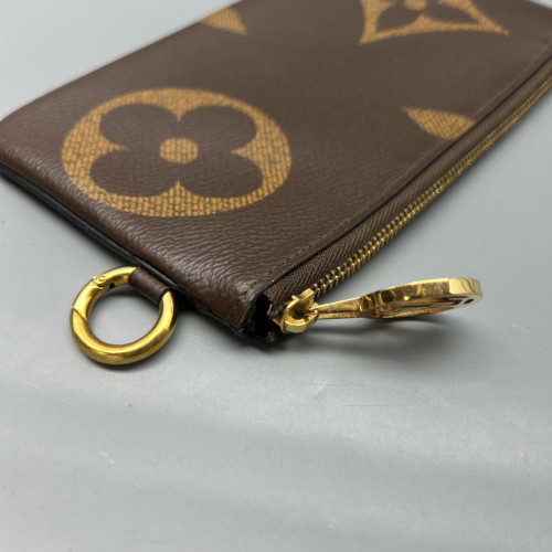 Louis Vuitton Trio Puch Reverse Monogram Brown