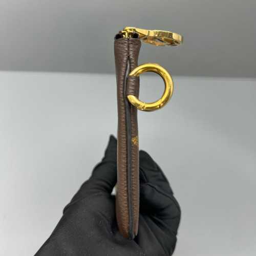 Louis Vuitton Trio Puch Reverse Monogram Brown