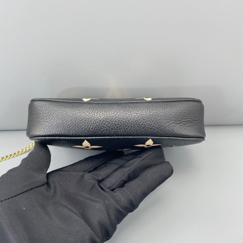 Louis Vuitton Mini Pochette Accessories Empreinte Monogram Giant Calfskin Black White