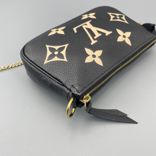 Louis Vuitton Mini Pochette Accessories Empreinte Monogram Giant Calfskin Black White