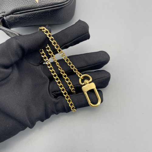 Louis Vuitton Mini Pochette Accessories Empreinte Monogram Giant Calfskin Black White