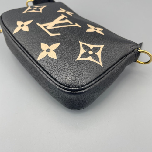 Louis Vuitton Mini Pochette Accessories Empreinte Monogram Giant Calfskin Black White