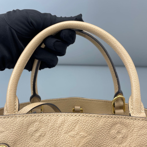 Louis Vuitton Montaigne MM Empreinte Monogram Natural Tan
