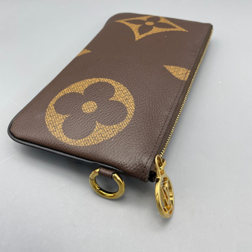 Louis Vuitton Trio Puch Reverse Monogram Brown