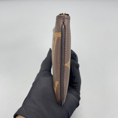 Louis Vuitton Trio Puch Reverse Monogram Brown