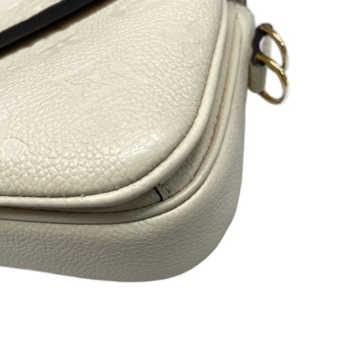 Louis Vuitton Pochette Metis East West Empreinte Monogram White